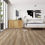 Frosted oak effect LVT flooring laid in a bedroom