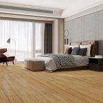 Manor oak effect LVT flooring laid in a bedroom