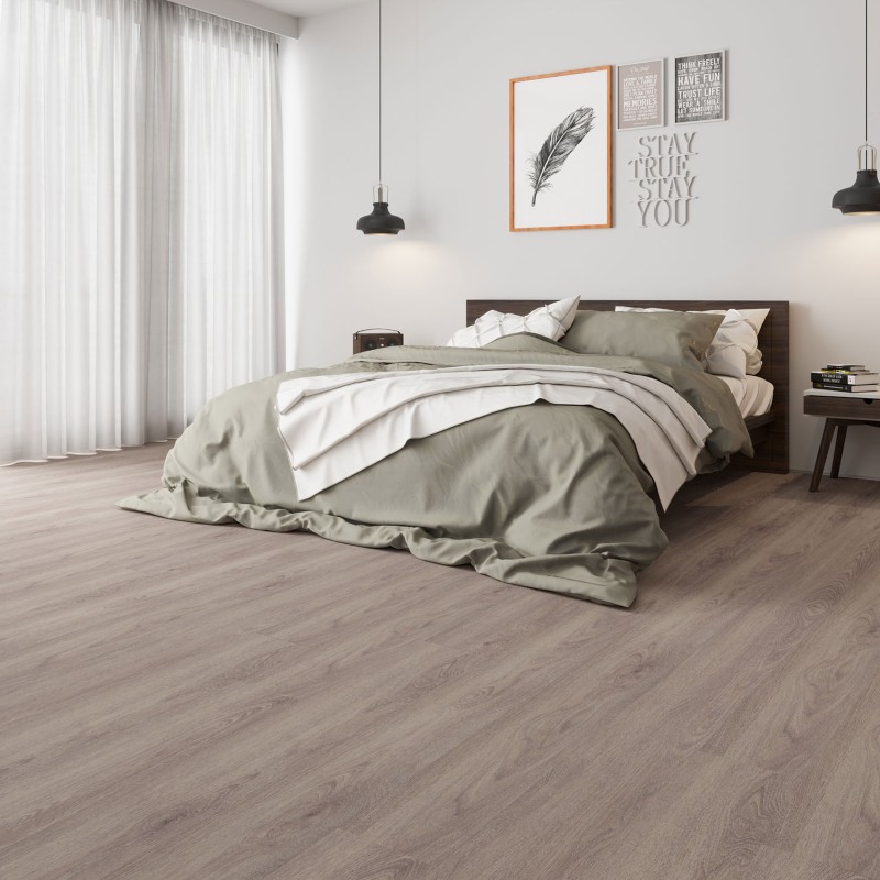 Silver oak effect LVT flooring laid in a bedroom