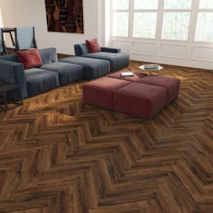 Chicory haze effect herringbone LVT flooring laid in a living room