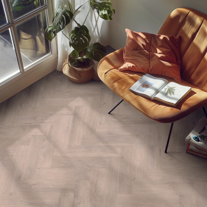 Ivory white effect herringbone LVT flooring laid in a living room