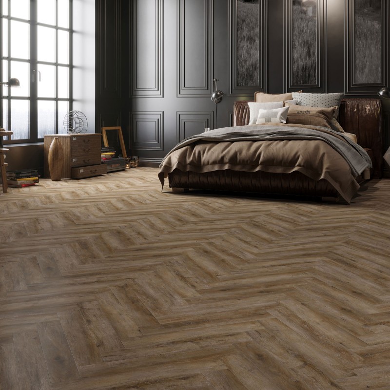 Smokey bay effect herringbone LVT flooring laid in a living room