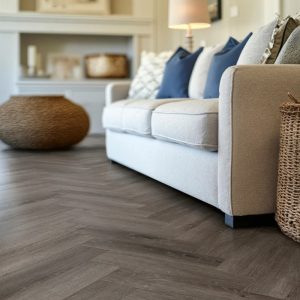 Urban dusk effect herringbone LVT flooring laid in a bathroom