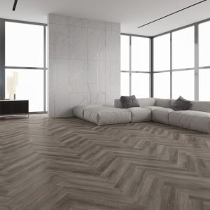 Urban dusk effect herringbone LVT flooring laid in a living room