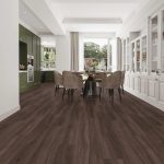 Dark umber effect LVT flooring laid in a kitchen